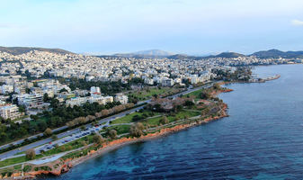Why are investors attracted to Greek real estate?